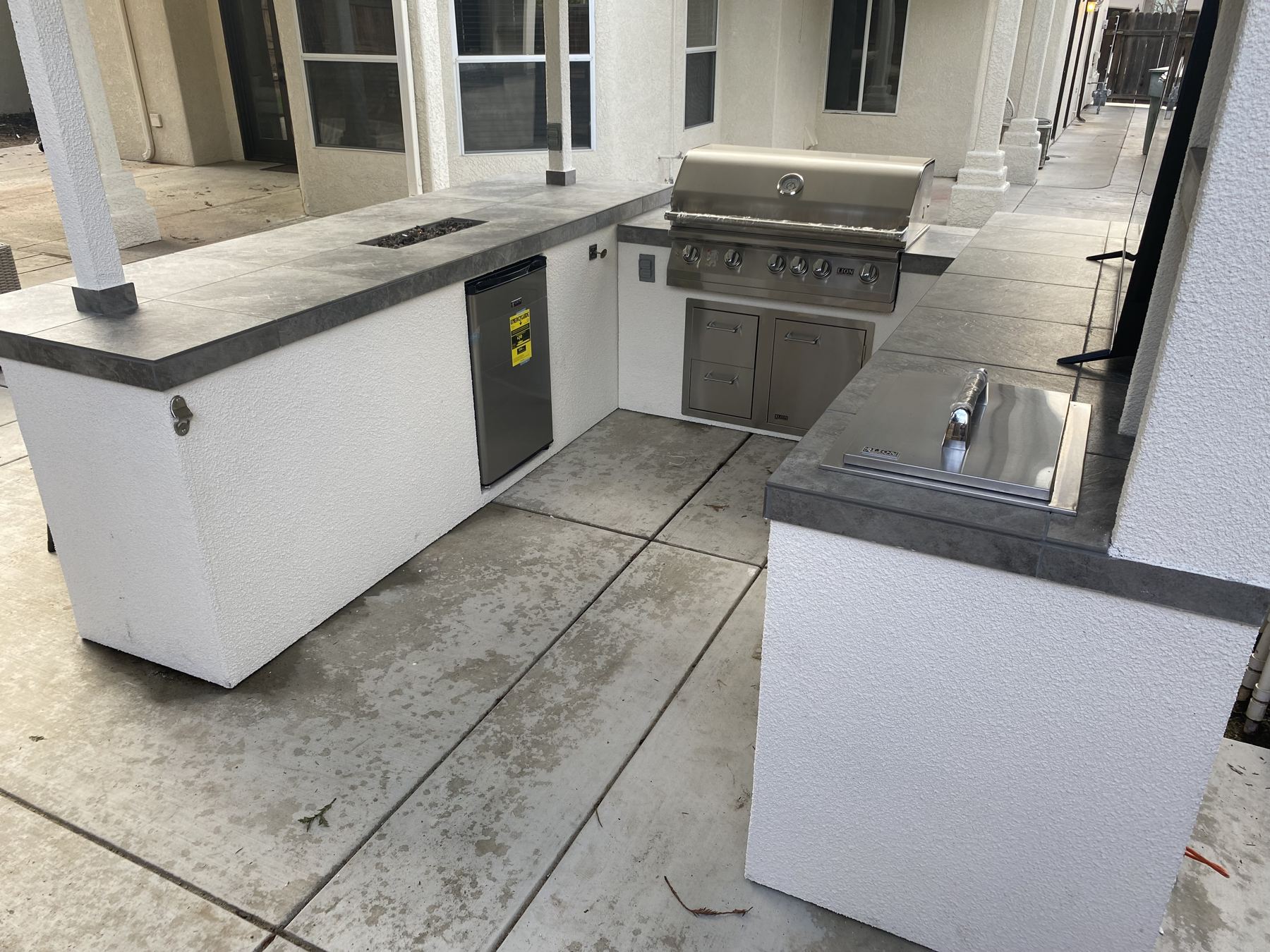 Covered outdoor kitchen built by Just BBQ Grills