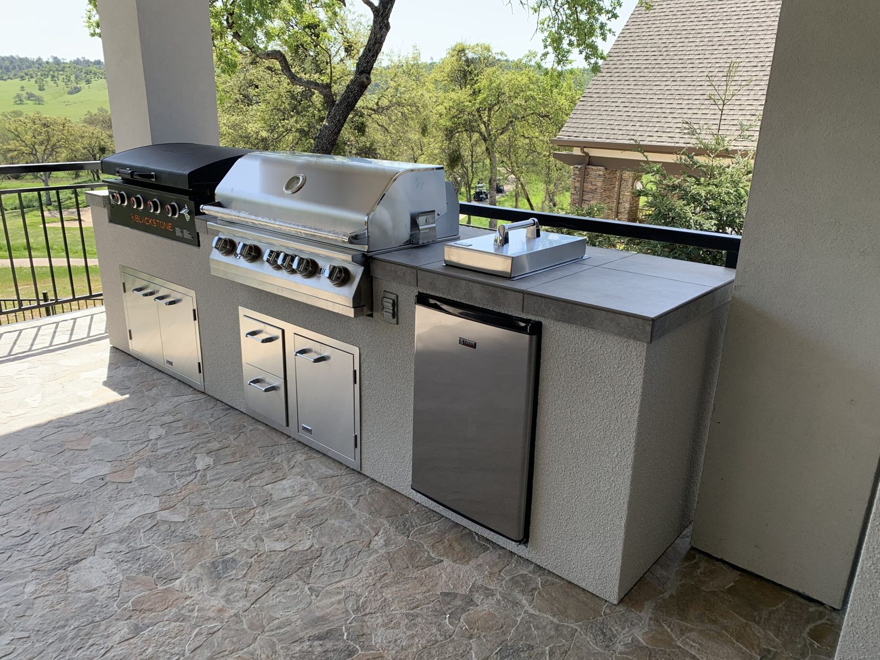 Custom covered outdoor kitchen built by Just BBQ Grills