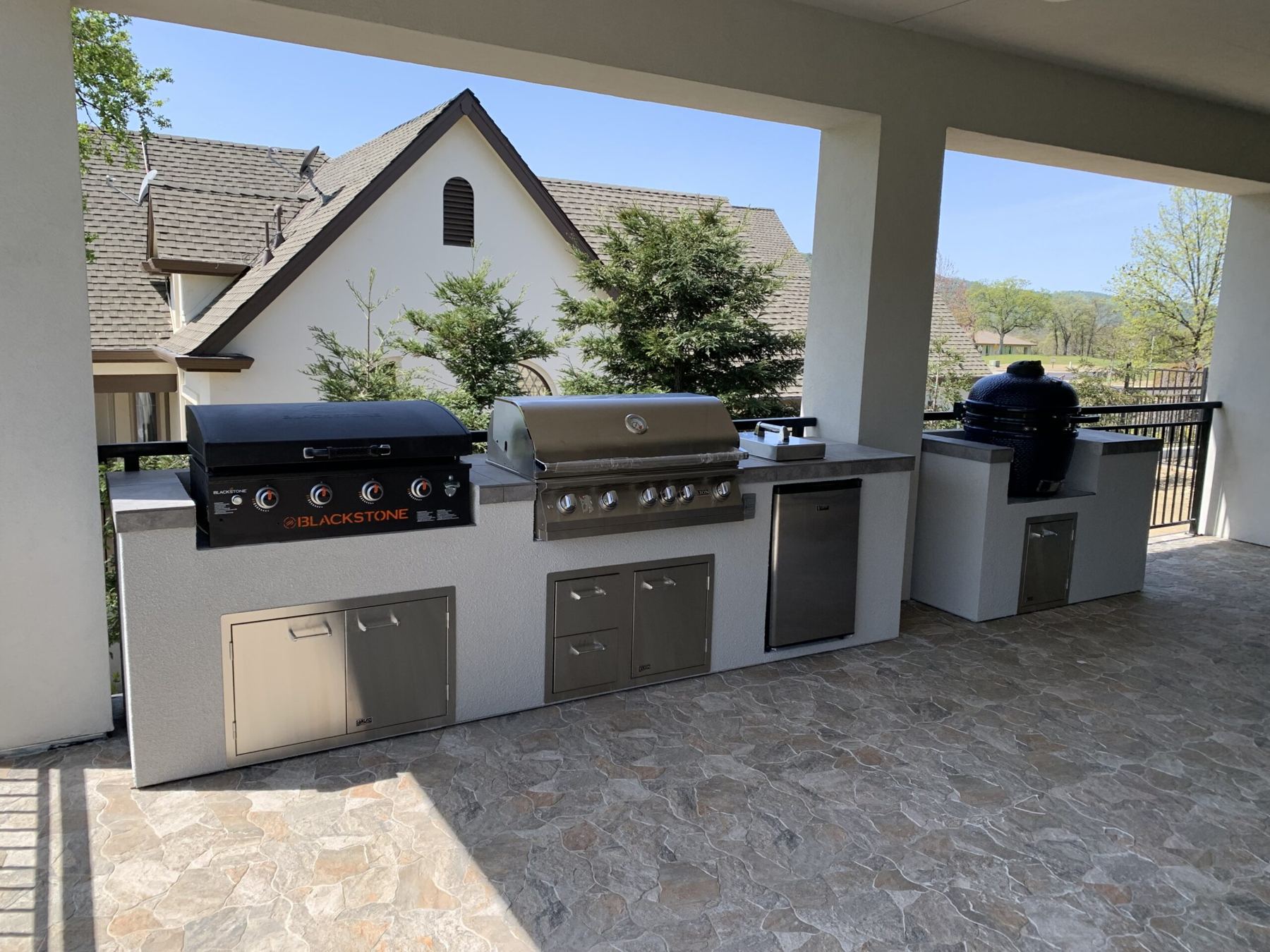 Custom covered outdoor kitchen built by Just BBQ Grills