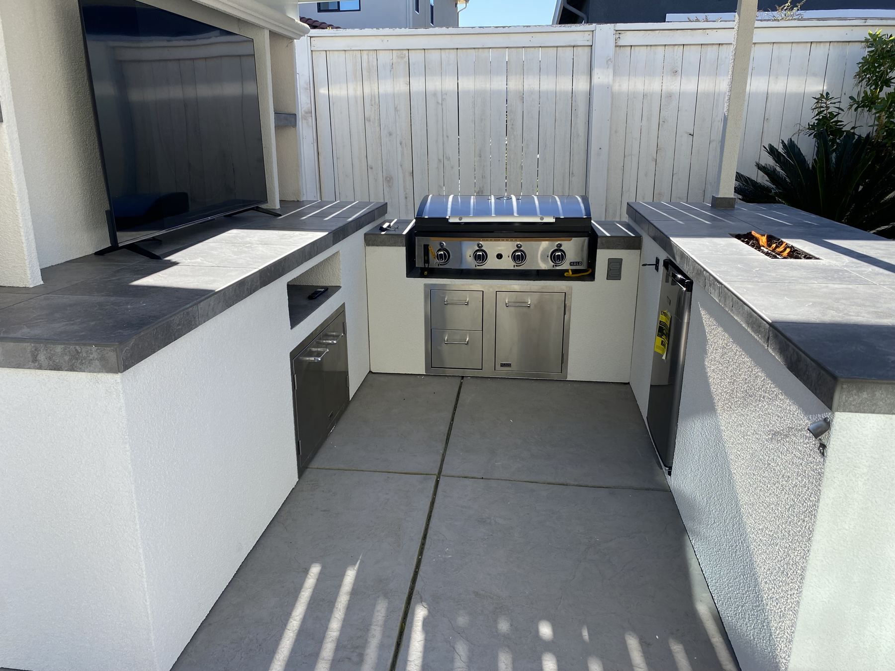 Covered outdoor kitchen built by Just BBQ Grills