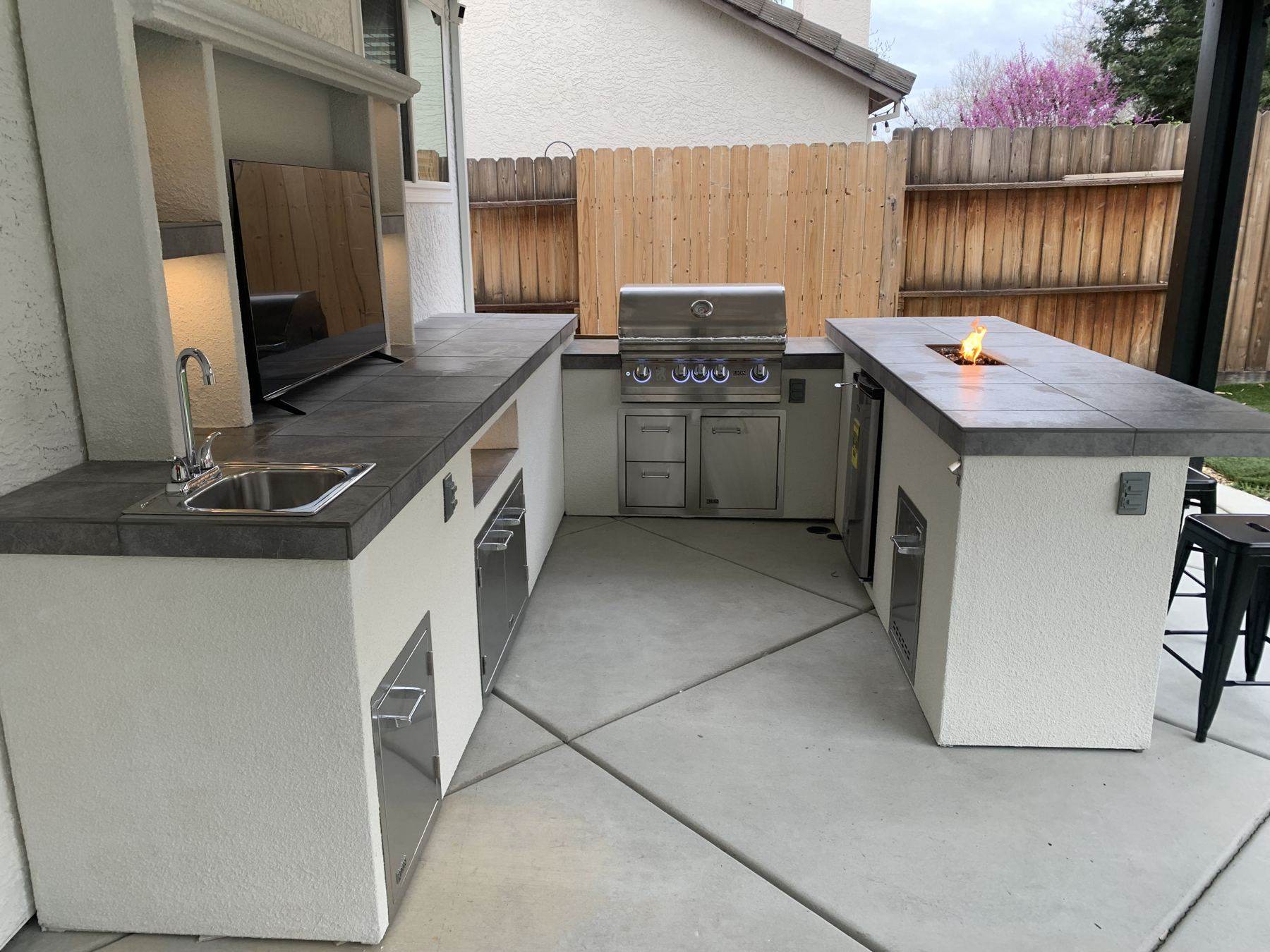 Covered outdoor kitchen built by Just BBQ Grills