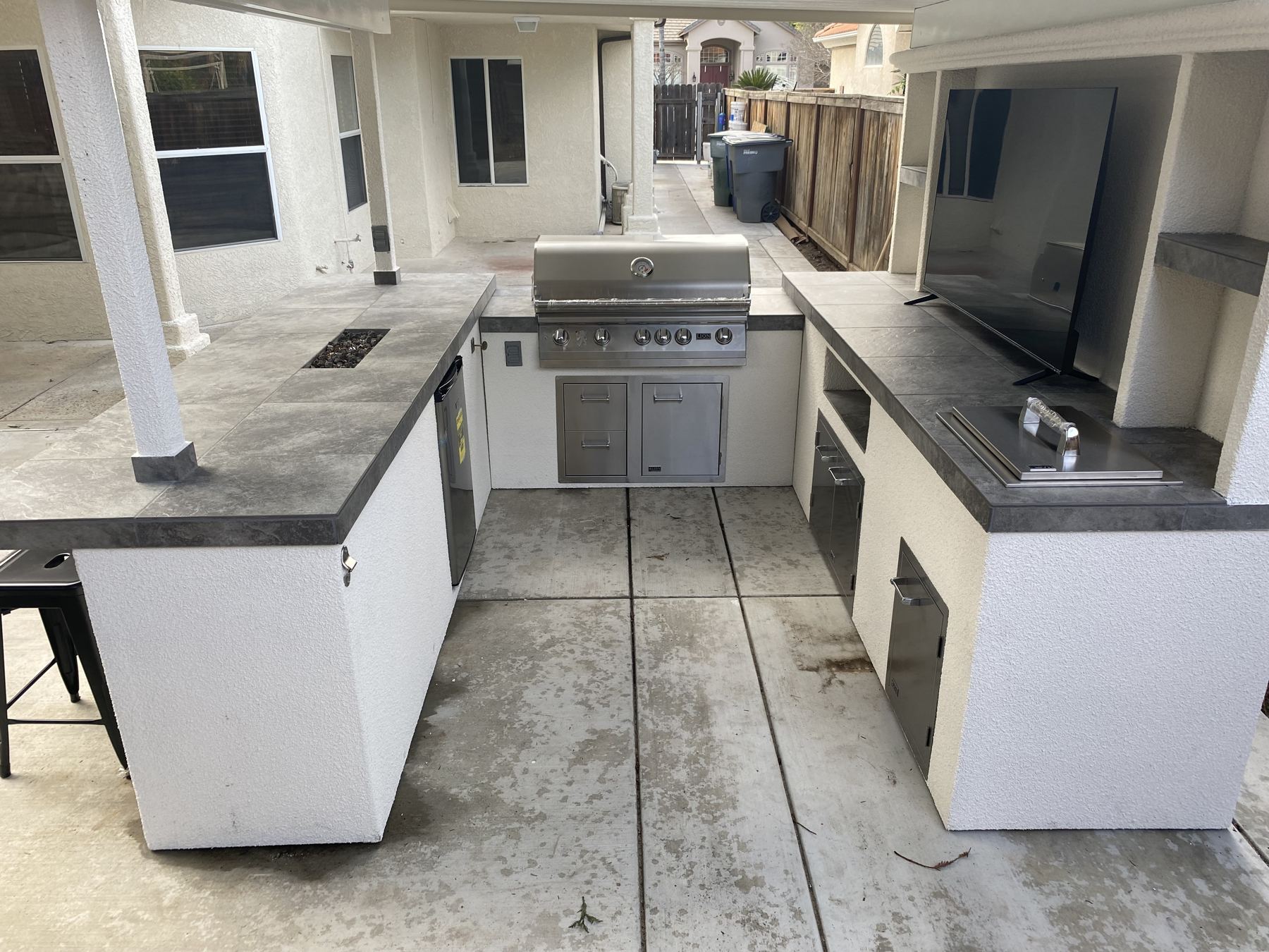 Covered outdoor kitchen built by Just BBQ Grills