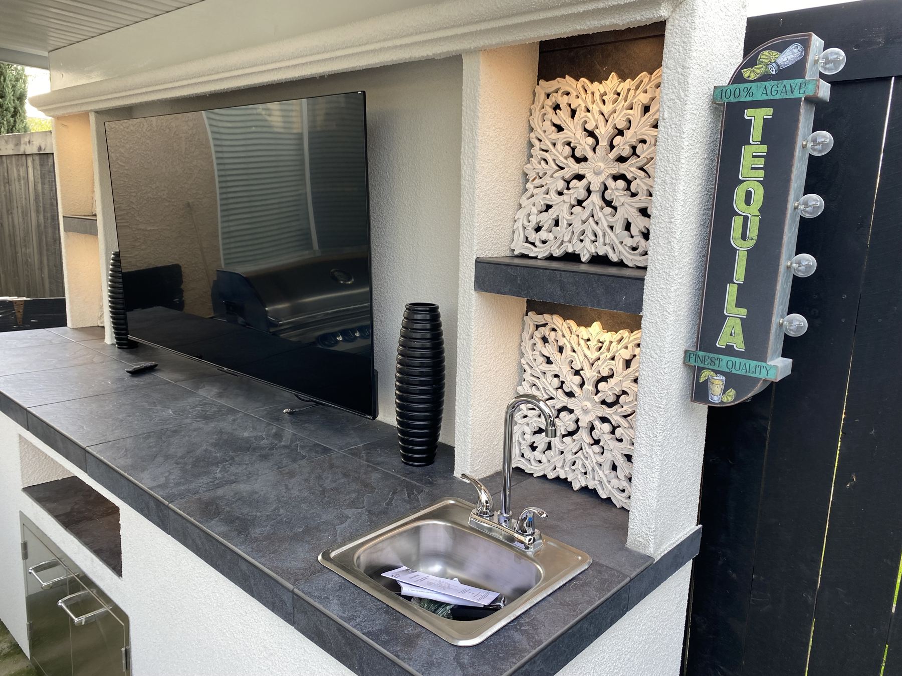 Covered outdoor kitchen built by Just BBQ Grills