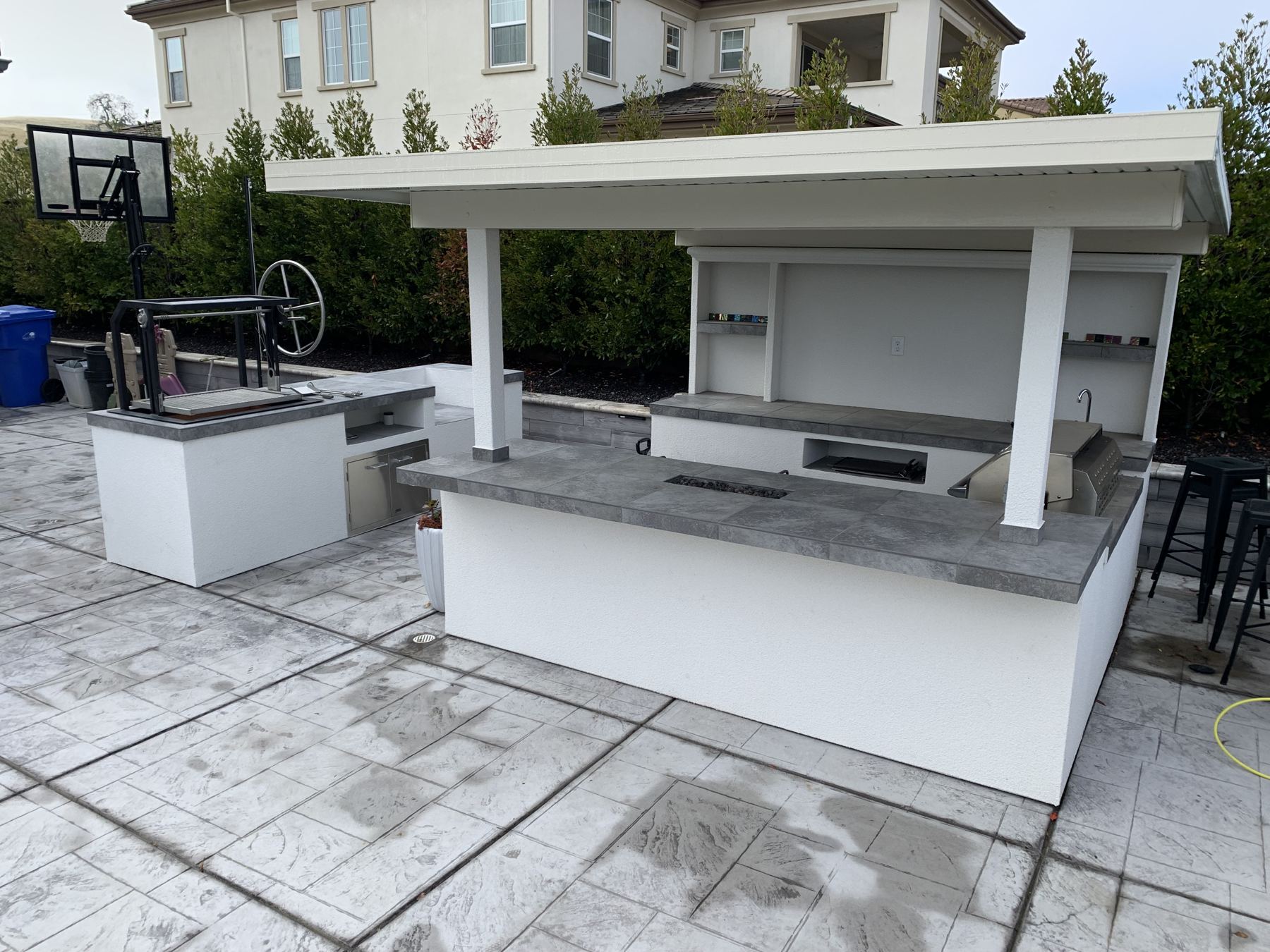 Covered outdoor kitchen built by Just BBQ Grills