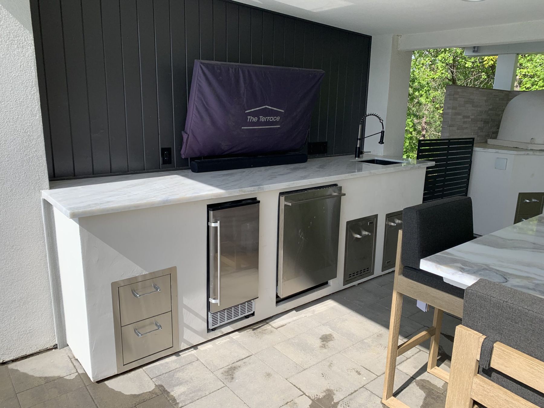 Custom covered outdoor kitchen built by Just BBQ Grills