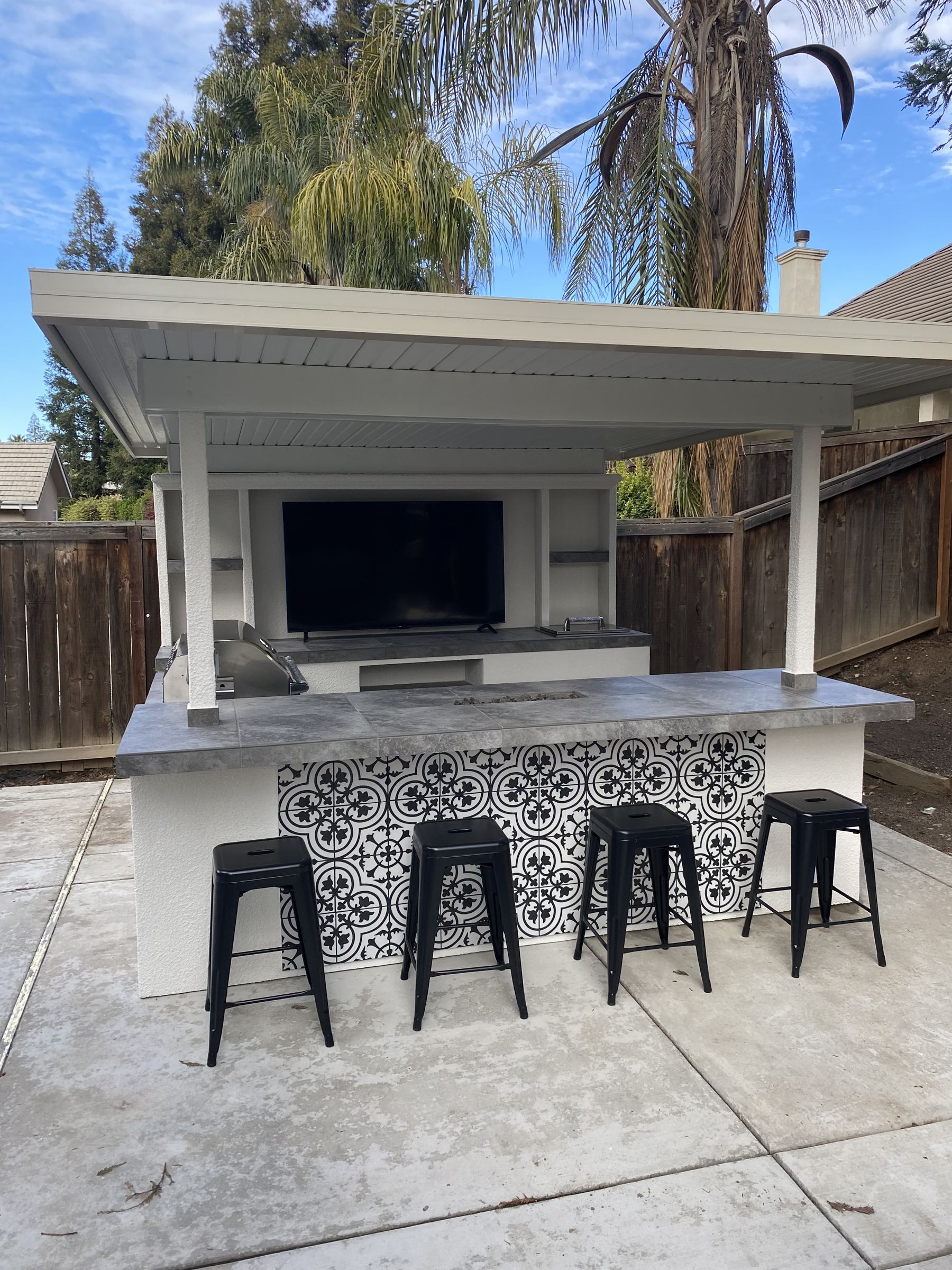 Covered outdoor kitchen built by Just BBQ Grills