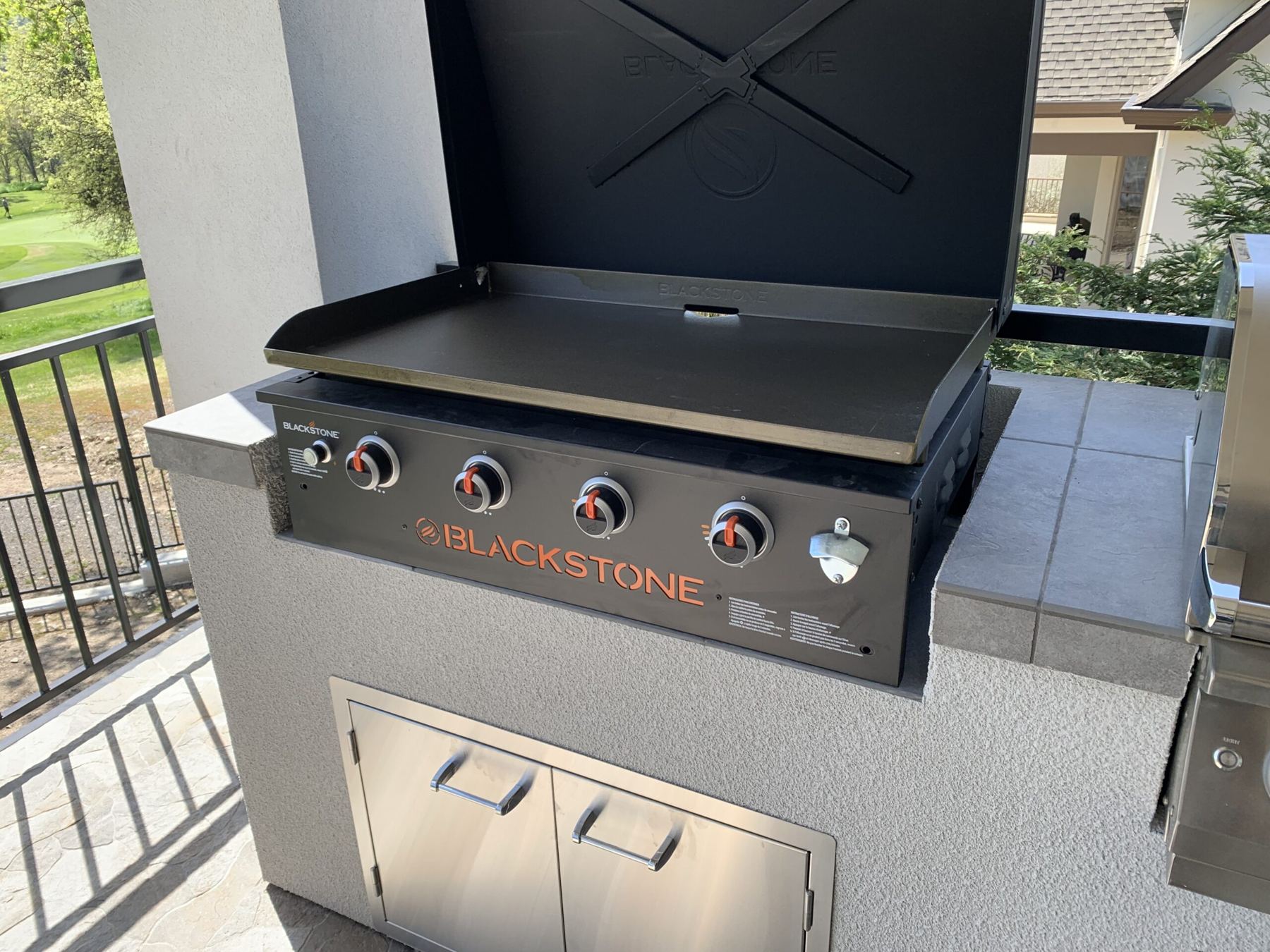 Custom covered outdoor kitchen built by Just BBQ Grills