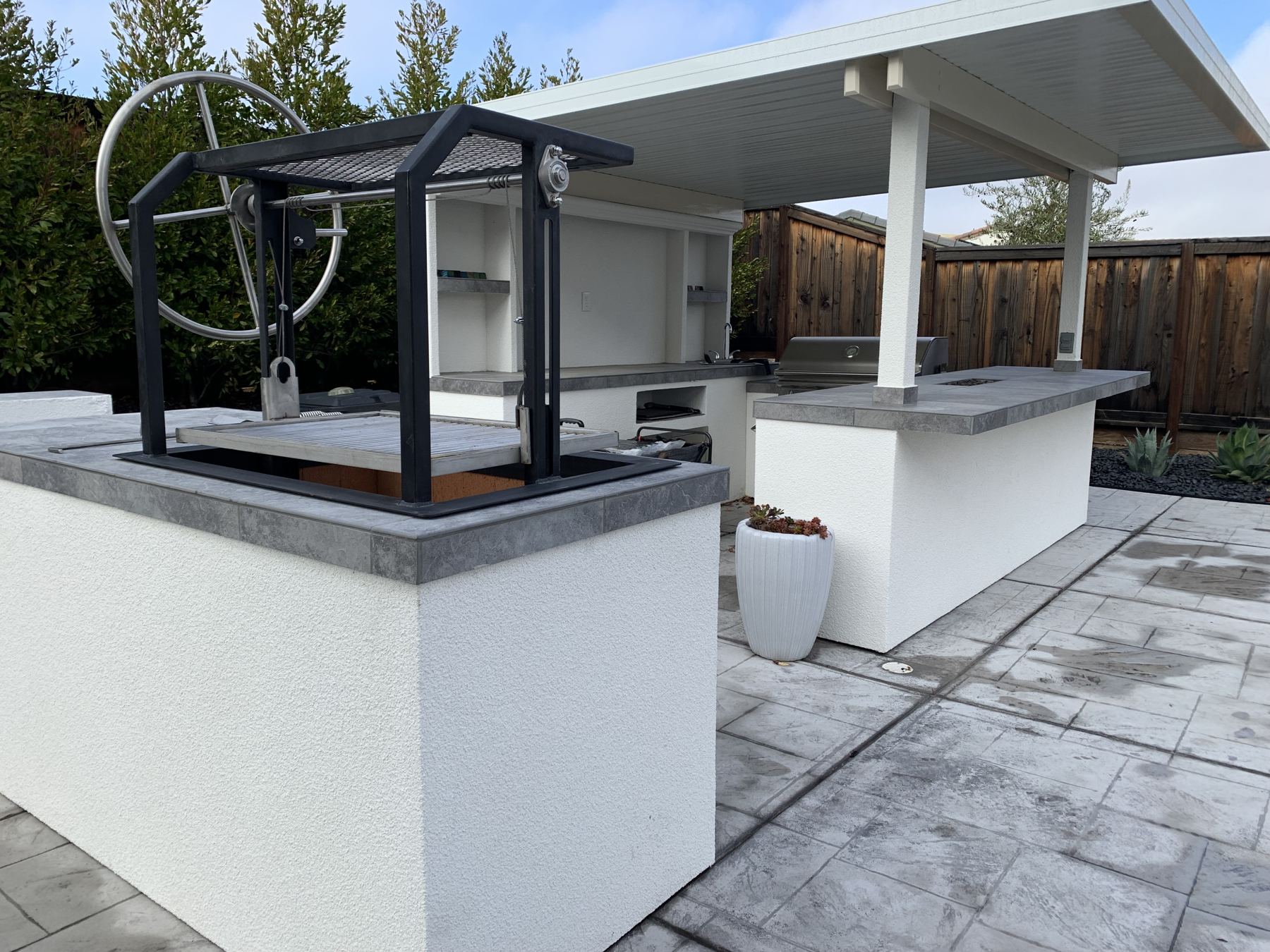 Covered outdoor kitchen built by Just BBQ Grills