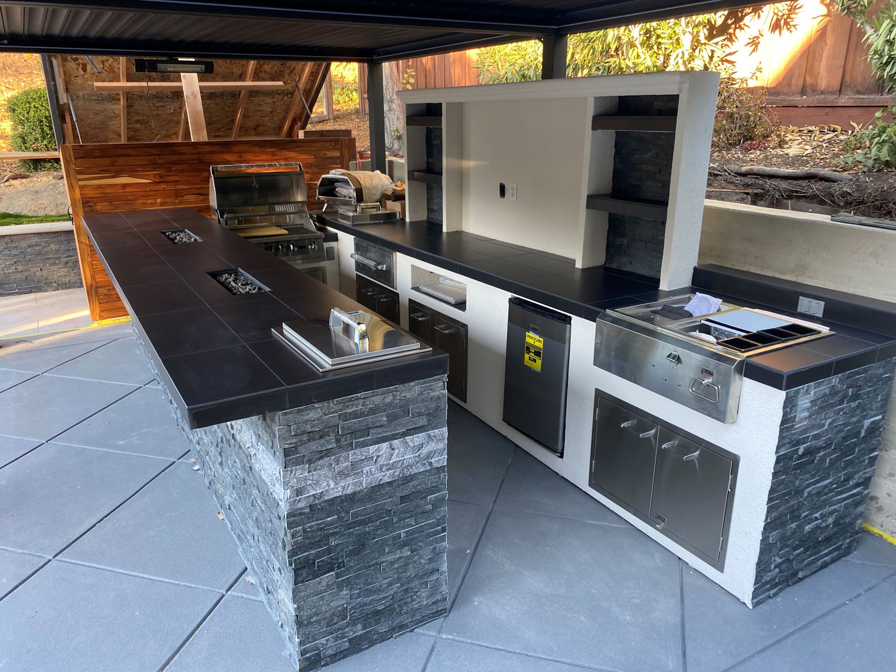 Custom covered outdoor kitchen built by Just BBQ Grills
