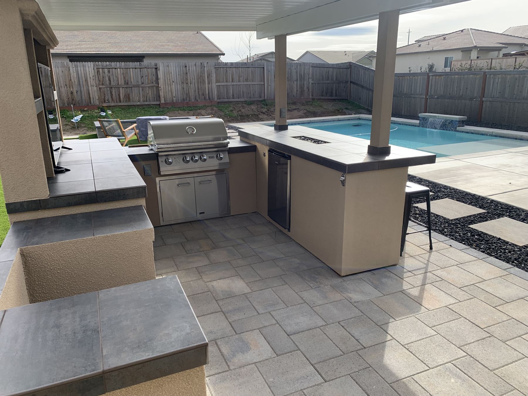 Covered outdoor kitchen built by Just BBQ Grills