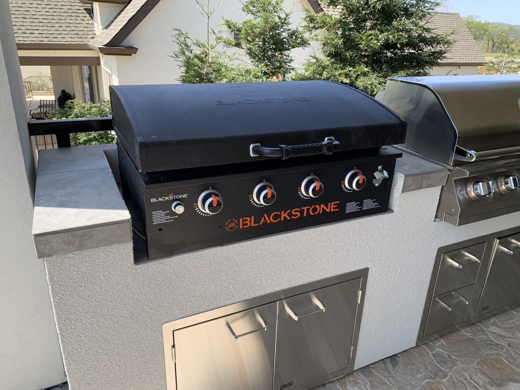 Custom covered outdoor kitchen built by Just BBQ Grills