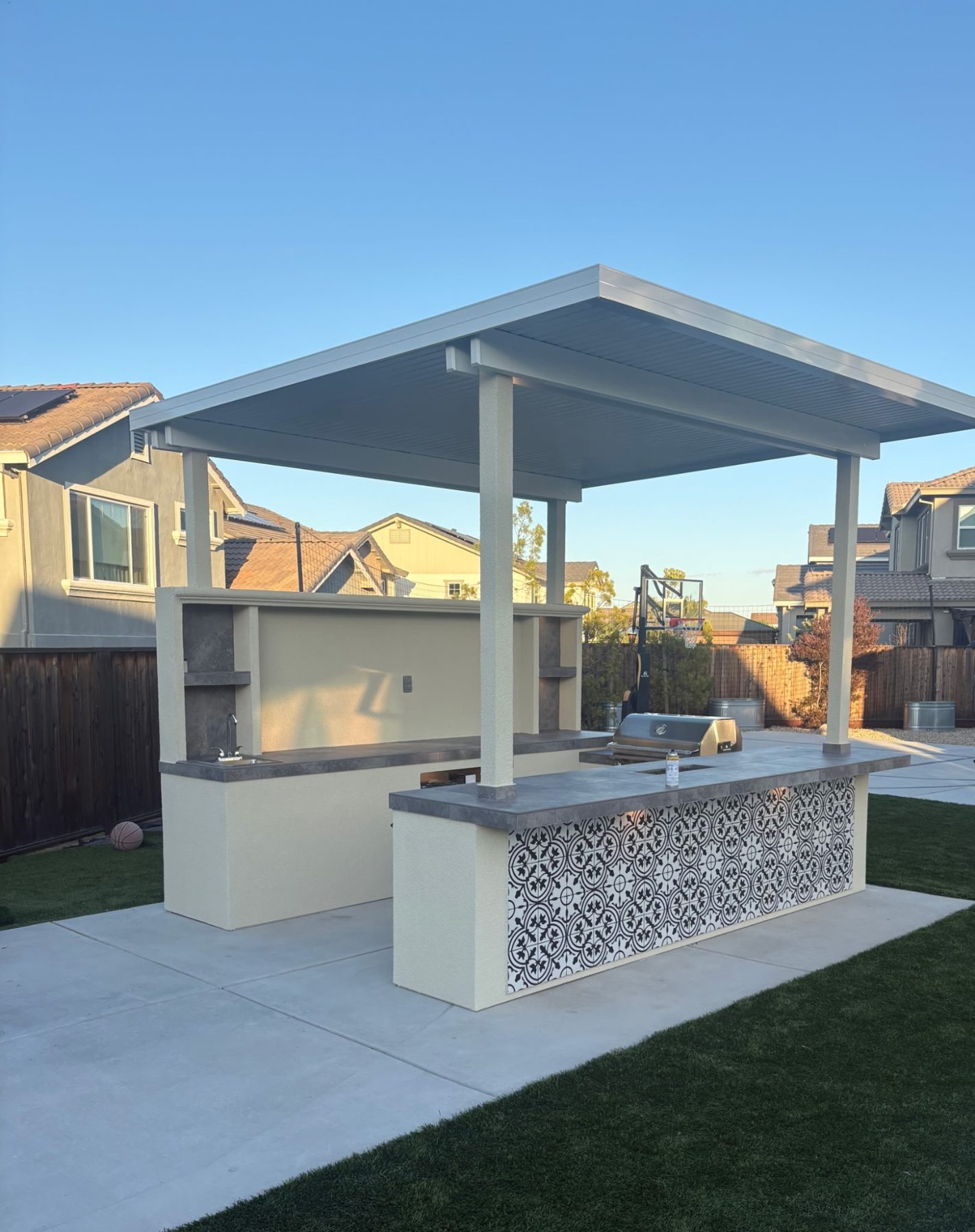 Entertainment cabana with decorative Spanish tile
