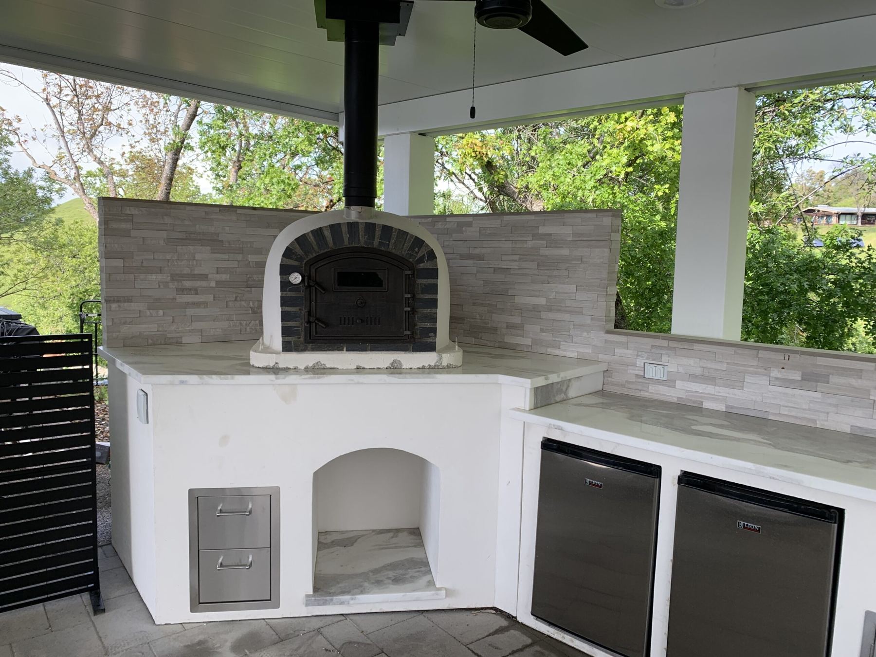 Custom covered outdoor kitchen built by Just BBQ Grills