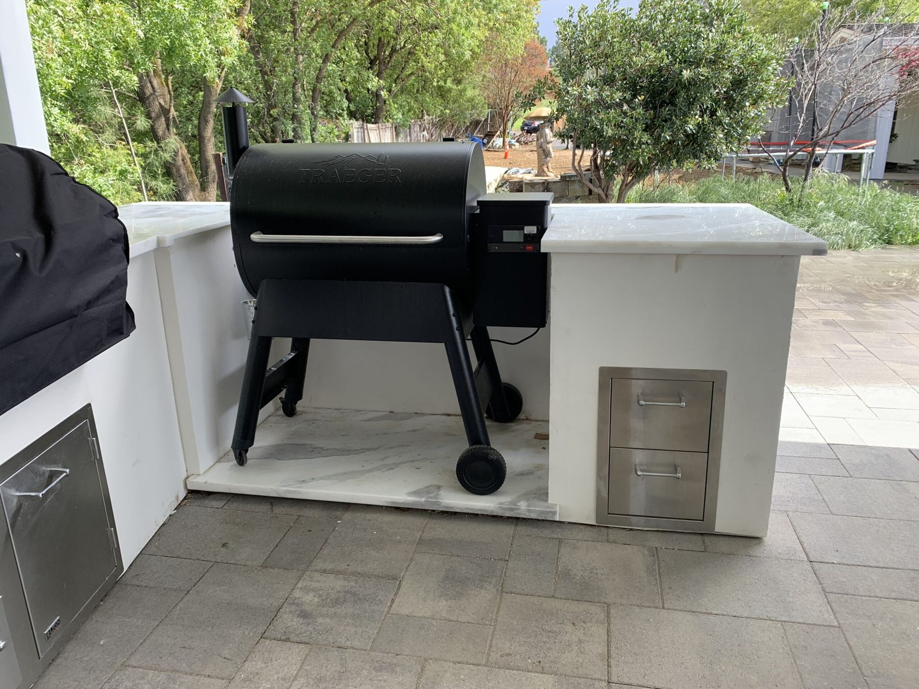 Custom covered outdoor kitchen built by Just BBQ Grills