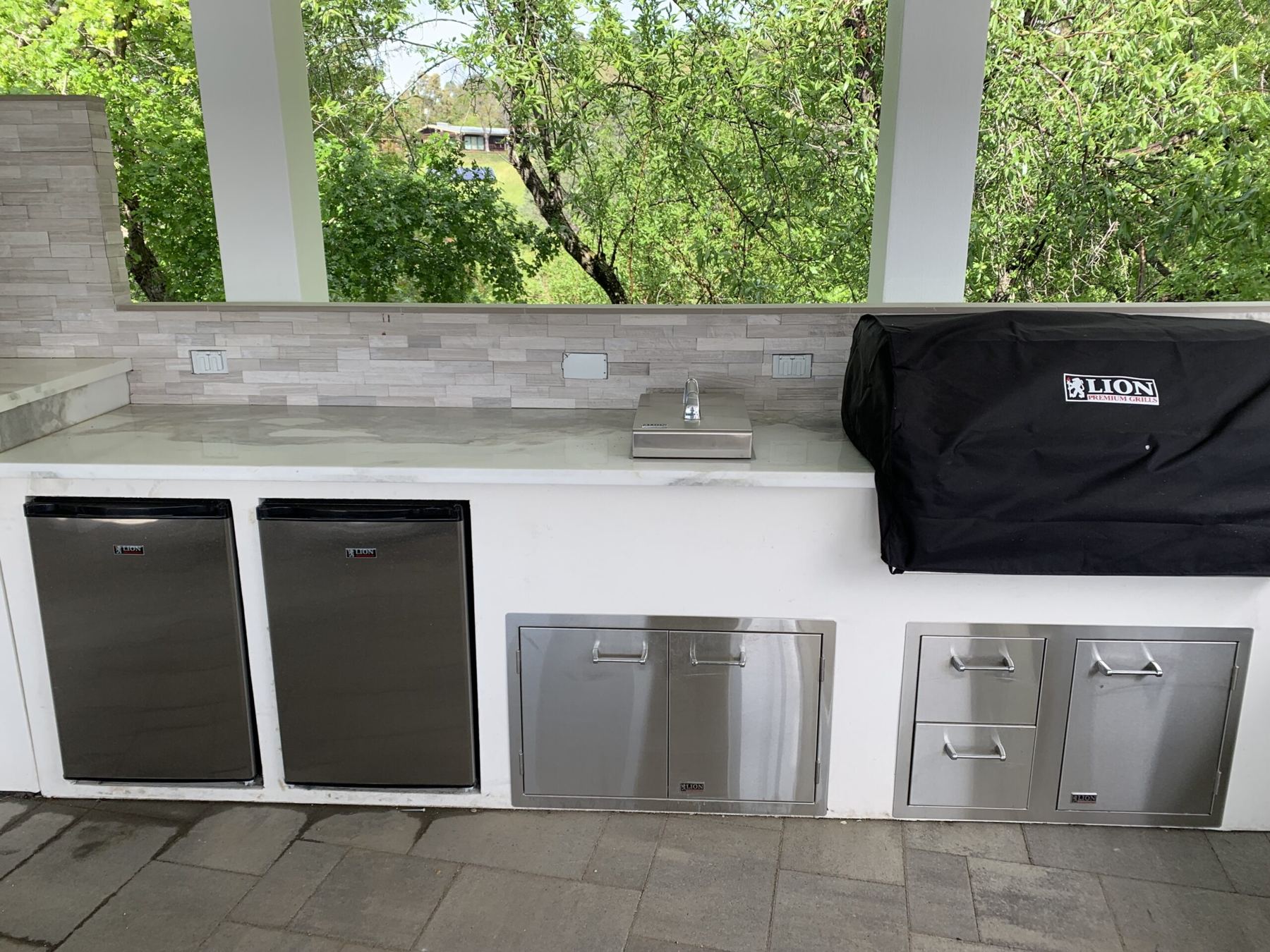 Custom covered outdoor kitchen built by Just BBQ Grills