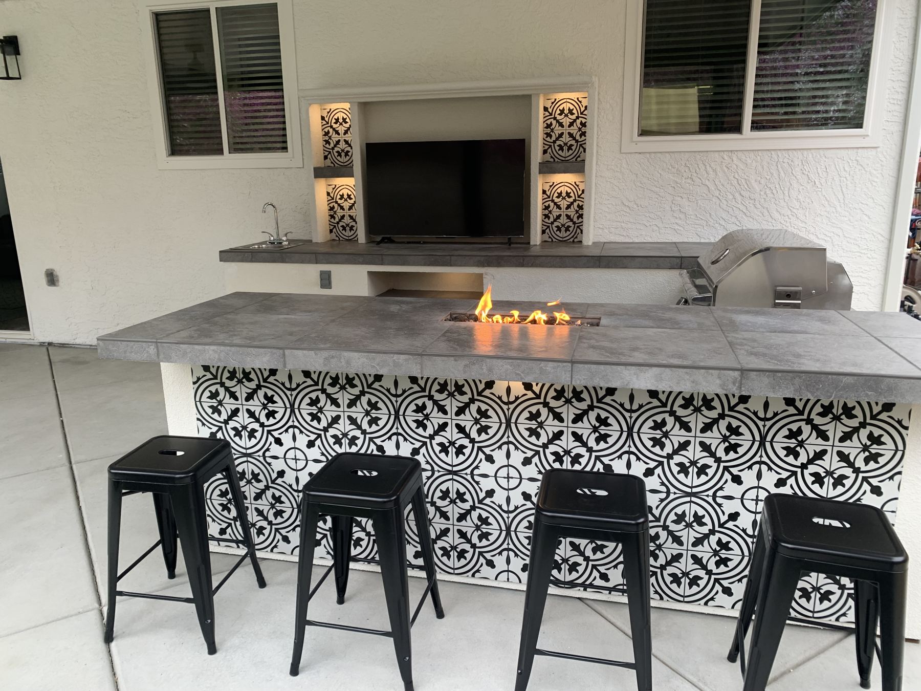 Covered outdoor kitchen built by Just BBQ Grills